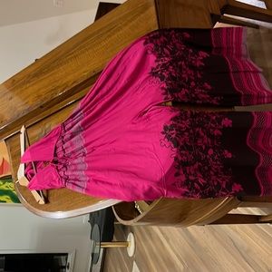 Fun romper, low cut, open back